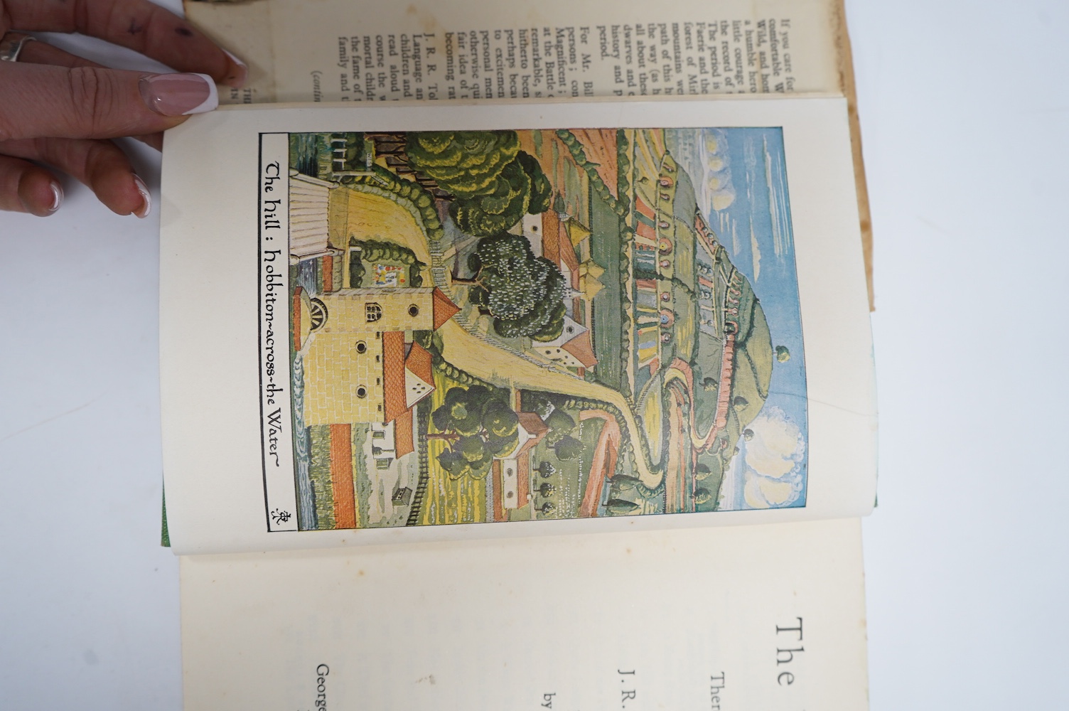 Tolkien J.R.R - The Hobbit, 2nd edition, 5th. impression, colour frontispiece, illustrations, map endpapers, top edge green, original green pictorial cloth, unclipped dust jacket, 8vo, George Allen & Unwin, London, 1951.